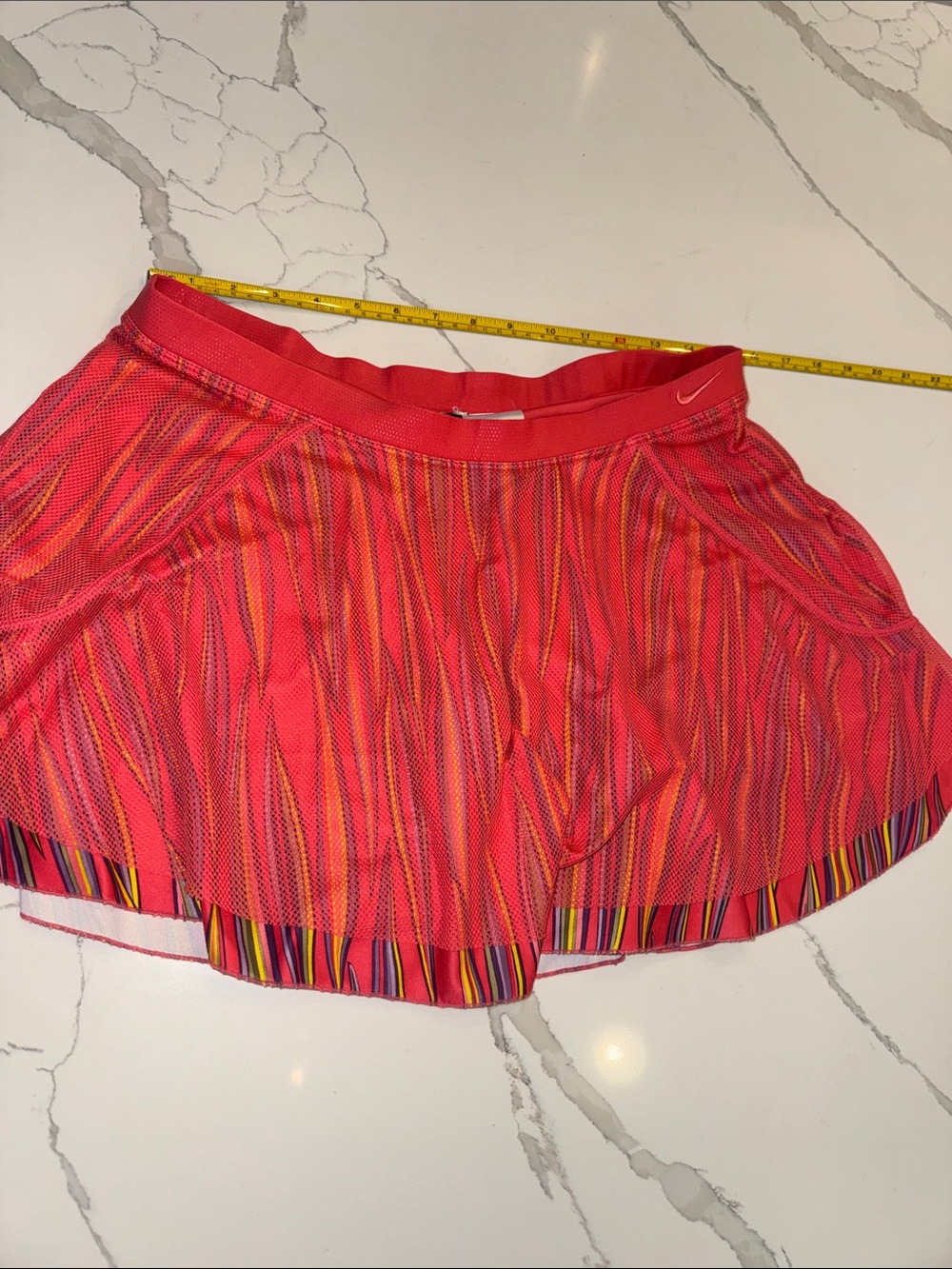 Nike Women’s Coral Pink Striped Athletic Skort
